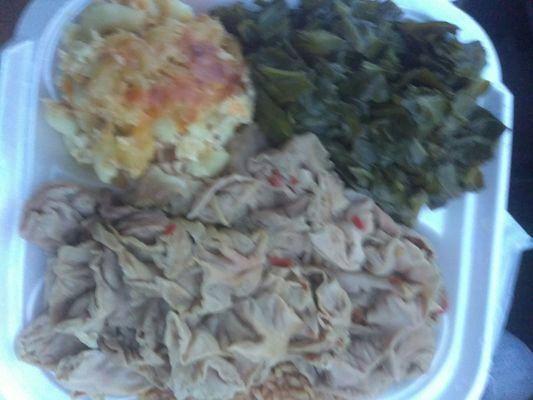 Chitterlings, pigeon peas and rice,  Mac & cheese, and collard greens. I'm overwhelmed by its goodness I've been craving this meal all day!