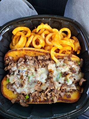 Cheesesteak and curly fries