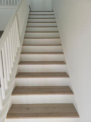 stair casing costume installation with white riser