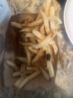 Greasy/soggy/undercooked fries.  You can see the grease on the container and it's puddled at the bottom.