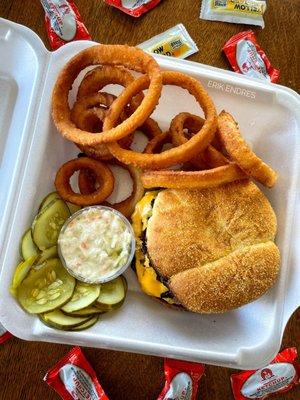 Carryout order of a Double Cheeseburger with grilled onions and an Onion Ring upgrade.