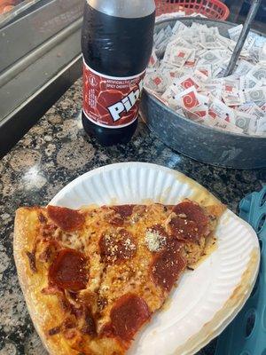 Pepperoni pizza with Mr. Pibb extra