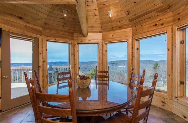 Log breakfast nook with overlook of the Catskill Mountains Dorini Log & Custom Homes www.dorinihomes.com