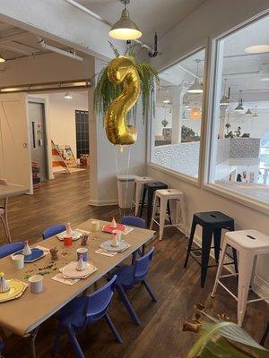 Upstairs eating area with birthday decorations