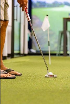 Short game work on our 6 hole putting green