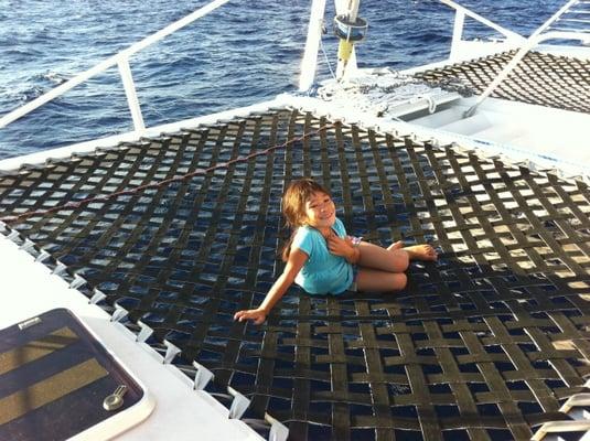 my daughter relaxing on the nets on-board the Spirit of Aloha!