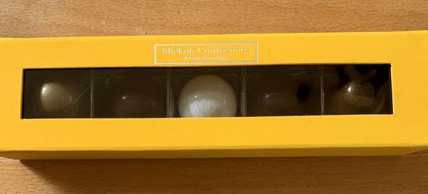 The box of 5 in a beautiful saffron-hued box complete with magnetic closure.