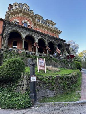 Outside the mansion