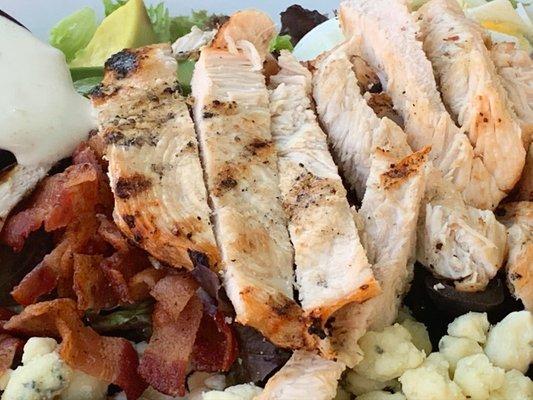 HT CHICKEN COBB SALAD (mixed greens, grilled chicken, avo, bacon, tomato, bleu cheese crumbles, black olives and eggs) choice of dressing