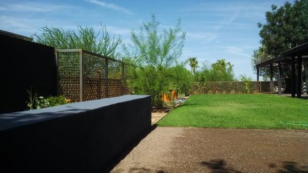 Stabilized granite seating area with smooth stucco seatwall.  Base of Squaw Peak mountain.