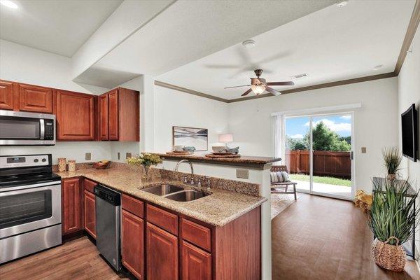 Kitchen with stainless steel appliances at Villas at Westover Hills