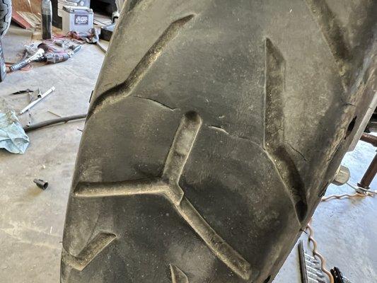 Manufacturing defective cracks in HD Dunlop tire.