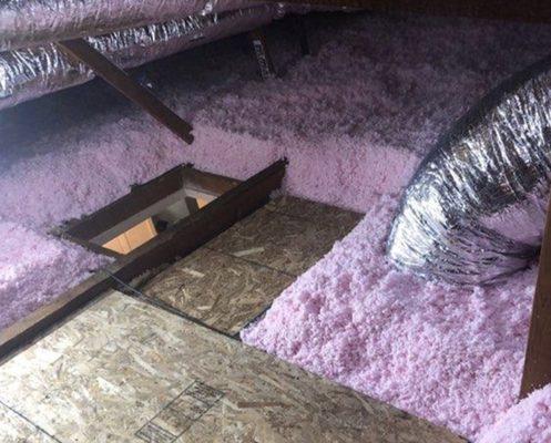 Here's the new R38 attic insulation blown in, providing superior thermal protection for the home.