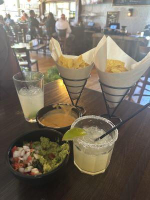 Chips and queso. Margarita, ranch water