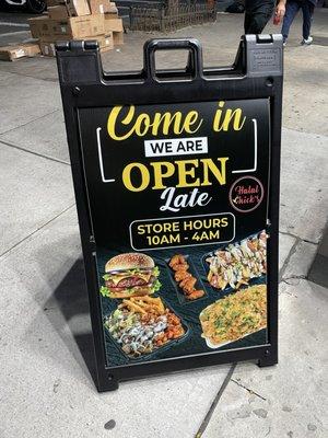 Sandwich board with hours