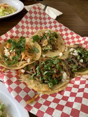 Four different tacos The carnitas was a bit bland but I could have eaten five of each of the other.  Meat was tasty and not at all dry.