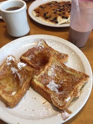 Triple stack of French toast, choc milk, and some blueberry pancakes. Best in town : )