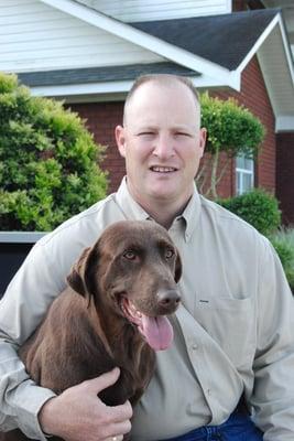 Dr. Sullivan and his lab, Bell.