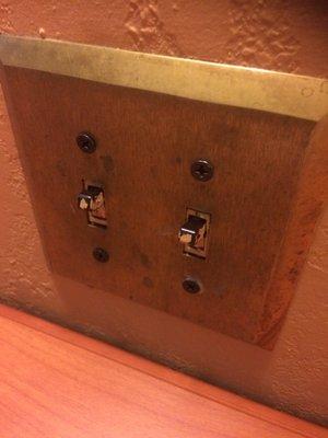 That's dirt on those light switches.