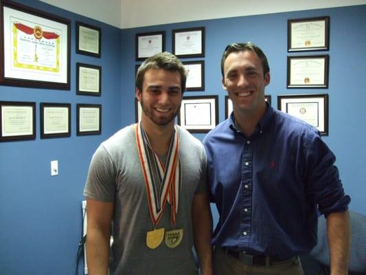 Dr. Don with one of the State Champion weight lifters.