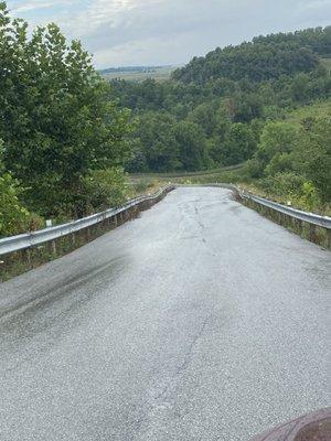 The sunken roadway you must take to get into the RV park.