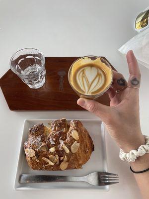 oatmilk cortado and almond croissant