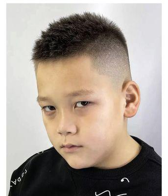 Short spiked boys haircut