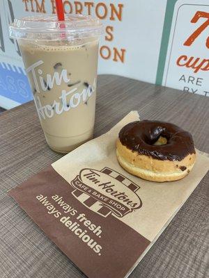 Iced coffee and chocolate glazed donut!