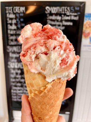 Strawberry cheesecake with a waffle cone