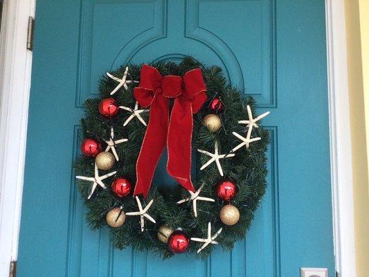 A few starfish added to our holiday wreath