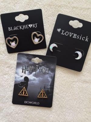 new ear bling (^_^) Quartz, Cats & Harry Potter! sweet!