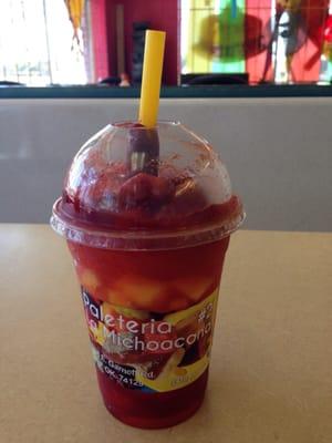 Diablito: strawberries, pineapples, mango, ice, lemon juice, hot sauce, & spicy tamarind candy-covered straw!