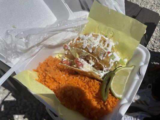 3 fried bistek tacos and Mexican rice.