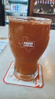 Pickle beer with michelada sauce.