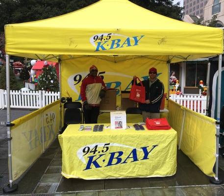 K-Bay booth at Christmas in the Park, San Jose on Sunday, December 13, 2015 with two very hip staffers working their booth!