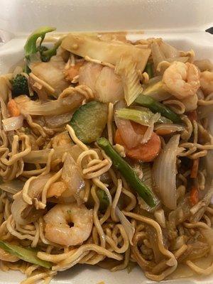 Garlic shrimp over noodles