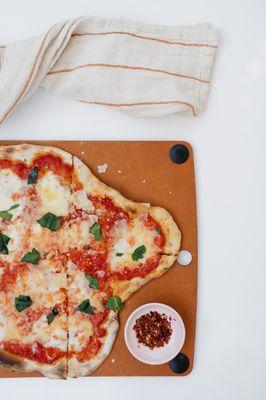 Margarita Flatbread: marina, mozzarella, basil, olive oil, and sea salt