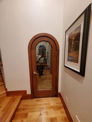 Custom Arched door to seal temperature in wine cellar