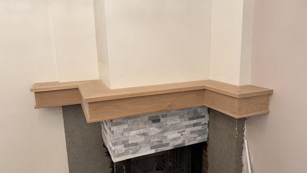 Custom oak fireplace mantle that we built.