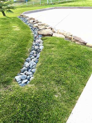 More rock along our driveway.