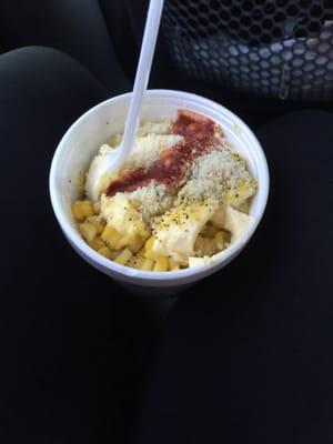 Corn in a cup  and you can put as much, and as many toppings as you like.