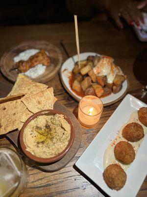 Hummus, potatoes, chicken thigh