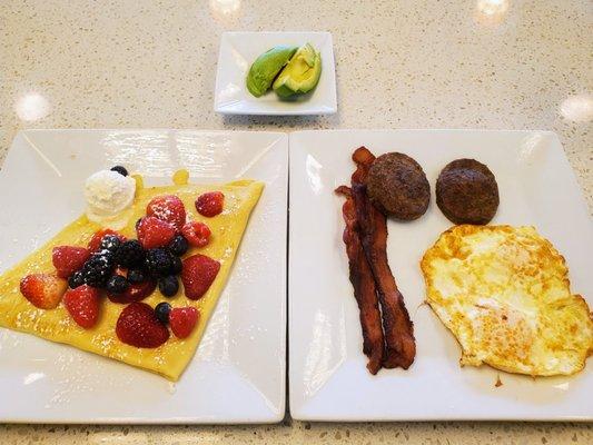 Breakfast combo with berry crepe