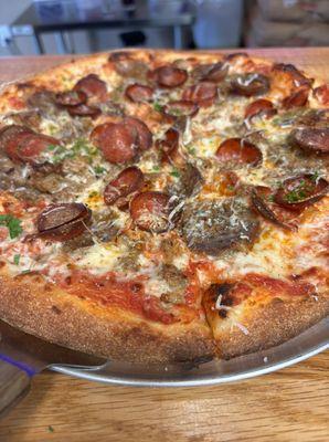 Meat The Parents 12" Round Pizza Pie - Tomato Sauce, Mozzarella, Pepperoni, House made meatballs, Sausage, Parmesan Cheese.