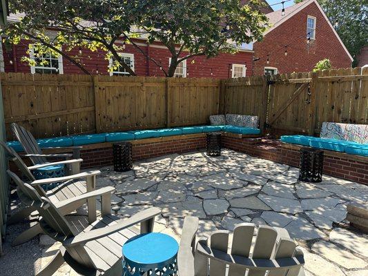 Comfortable patio seating with fire pit!