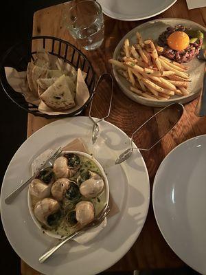 Escargots de Bourgogne and steak tartare