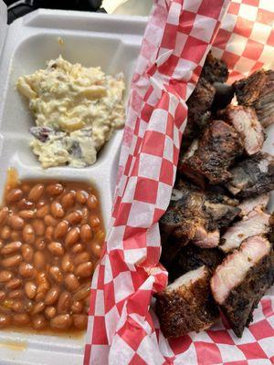 Pork rib tips, baked beans and potato salad