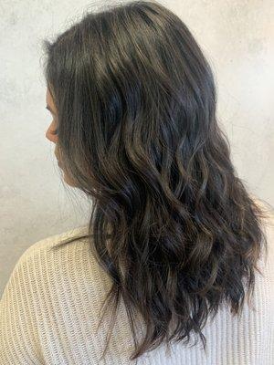 Textured cut with lived in waves.