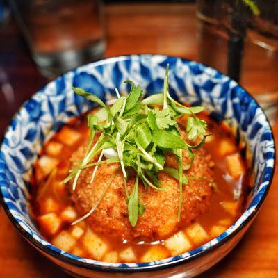 Fried birria risotto, braised short rib, queso Oaxaca, consume