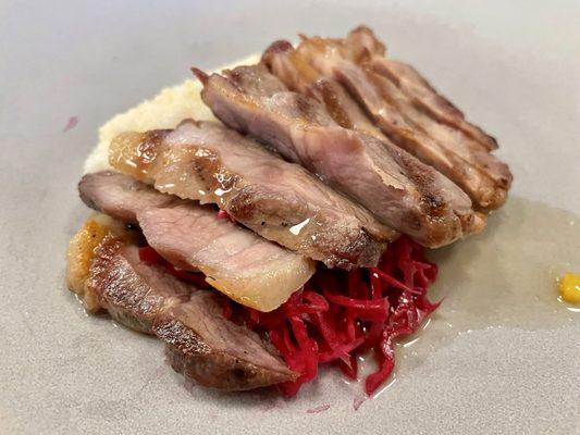 Confit pork with stone-ground grits